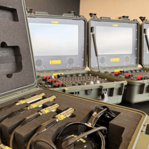Three C-Vision Encrypt systems opened with control panels visible in the background and accessory kit displayed in the foreground.