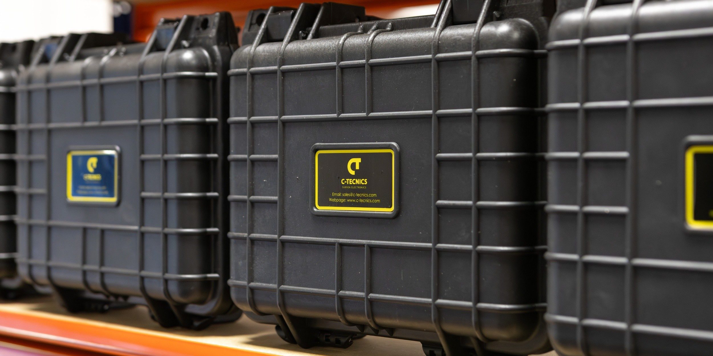 C-Tecnics E-Phone diver radios stored in protective cases